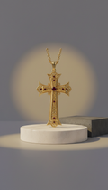 Statement pendant with gilded cross